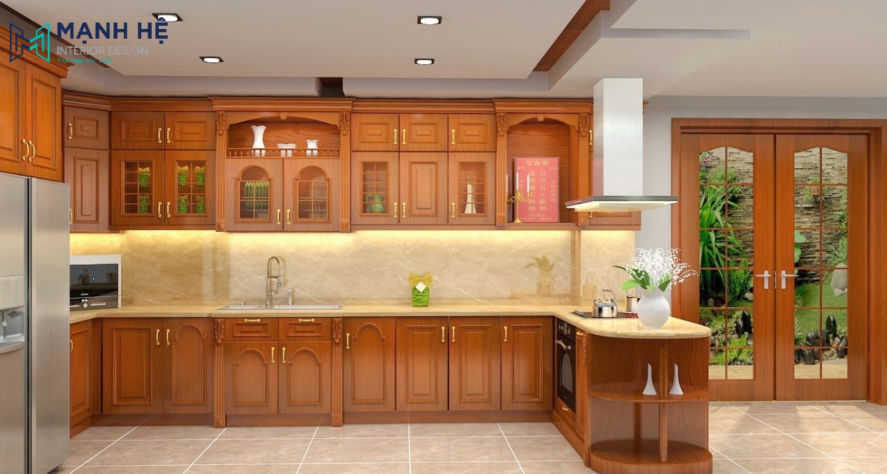 Tủ bếp gỗ xoan đào chữ U lớn và hoành tráng được thiết kế liền mạch đem lại cảm giác ấm cúng, thiết kế hiện đại và sang trọng. 
