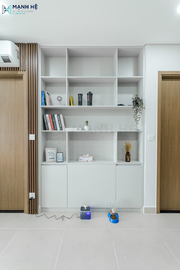 Thi công tủ trang trí kết hợp kệ sách âm tường sơn màu xám hiện đại