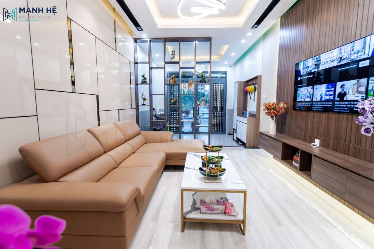 Bộ bàn ghế sofa bọc nệm chữ L đặt ngay trung tâm phòng khách đẹp hiện đại