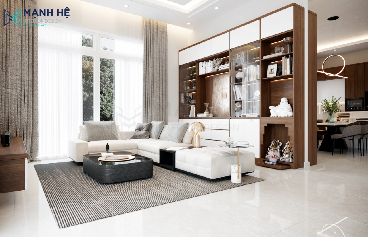 Kệ tủ sách đặt phía sau ghế sofa làm vách ngăn không gian phòng khách bếp tinh tế