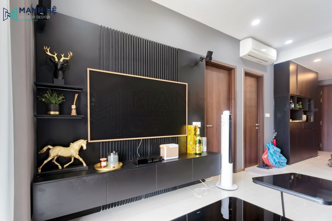 Vách lam sang trọng kết hợp đường viền bo góc tivi nổi bật