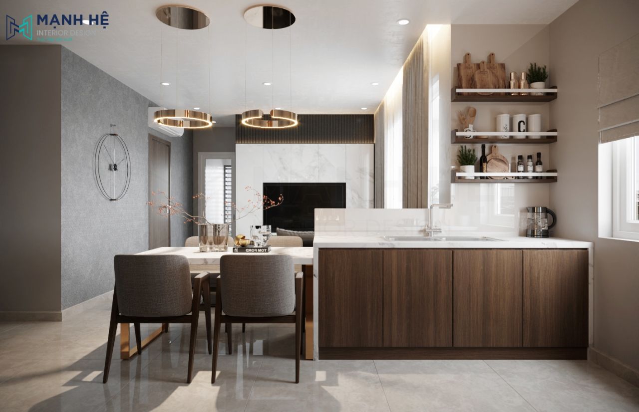 Bồn rửa được thiết kế ốp đá vân mây giúp gia chủ dễ dàng lau chùi và đồng bộ hơn với các chi tiết trong phòng khách liền bếp