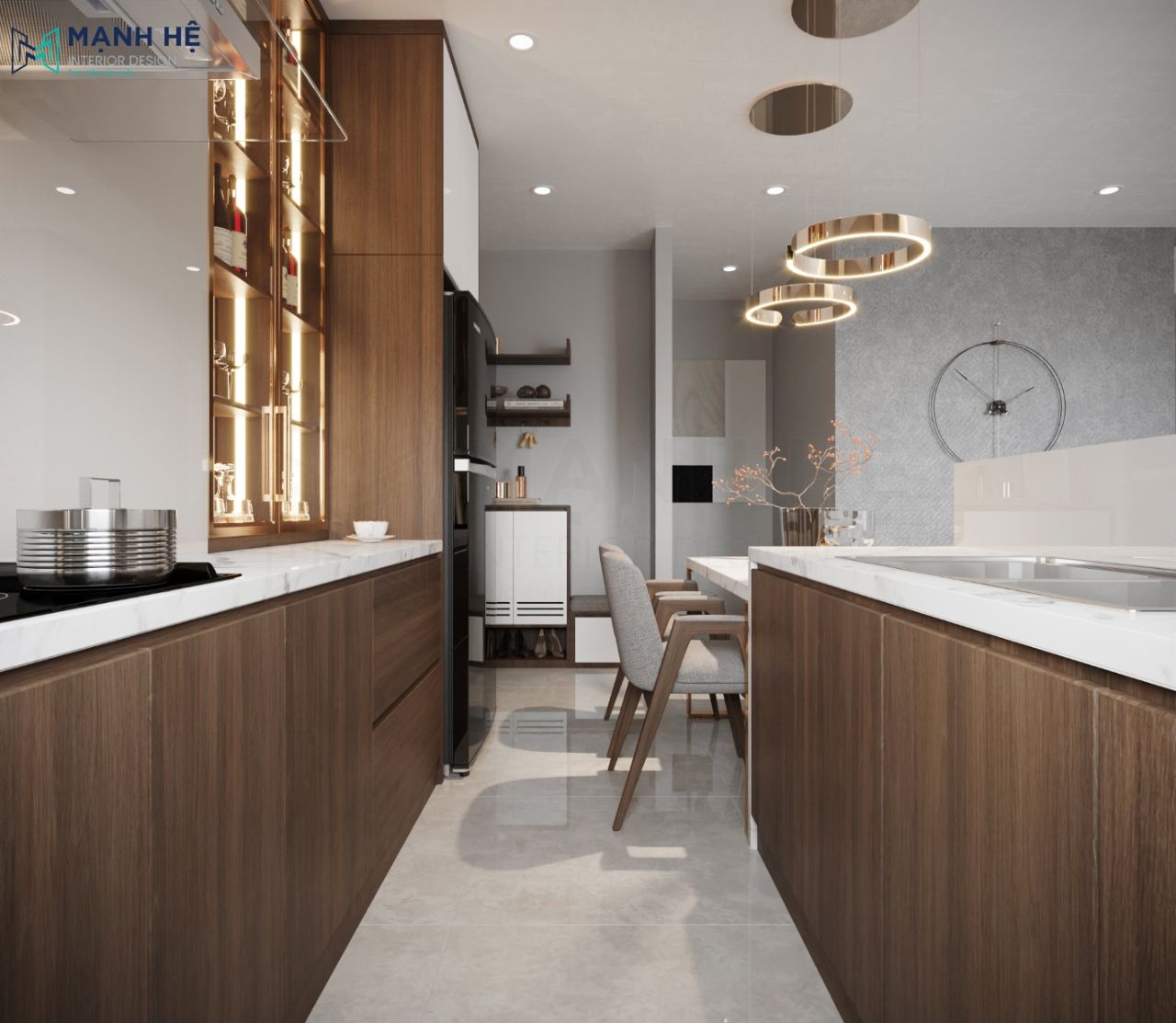 Hệ tủ bếp dưới được thiết kế màu gỗ trầm phủ melamine mặt nhám chống trầy xước tăng thẩm mỹ cho gian bếp.