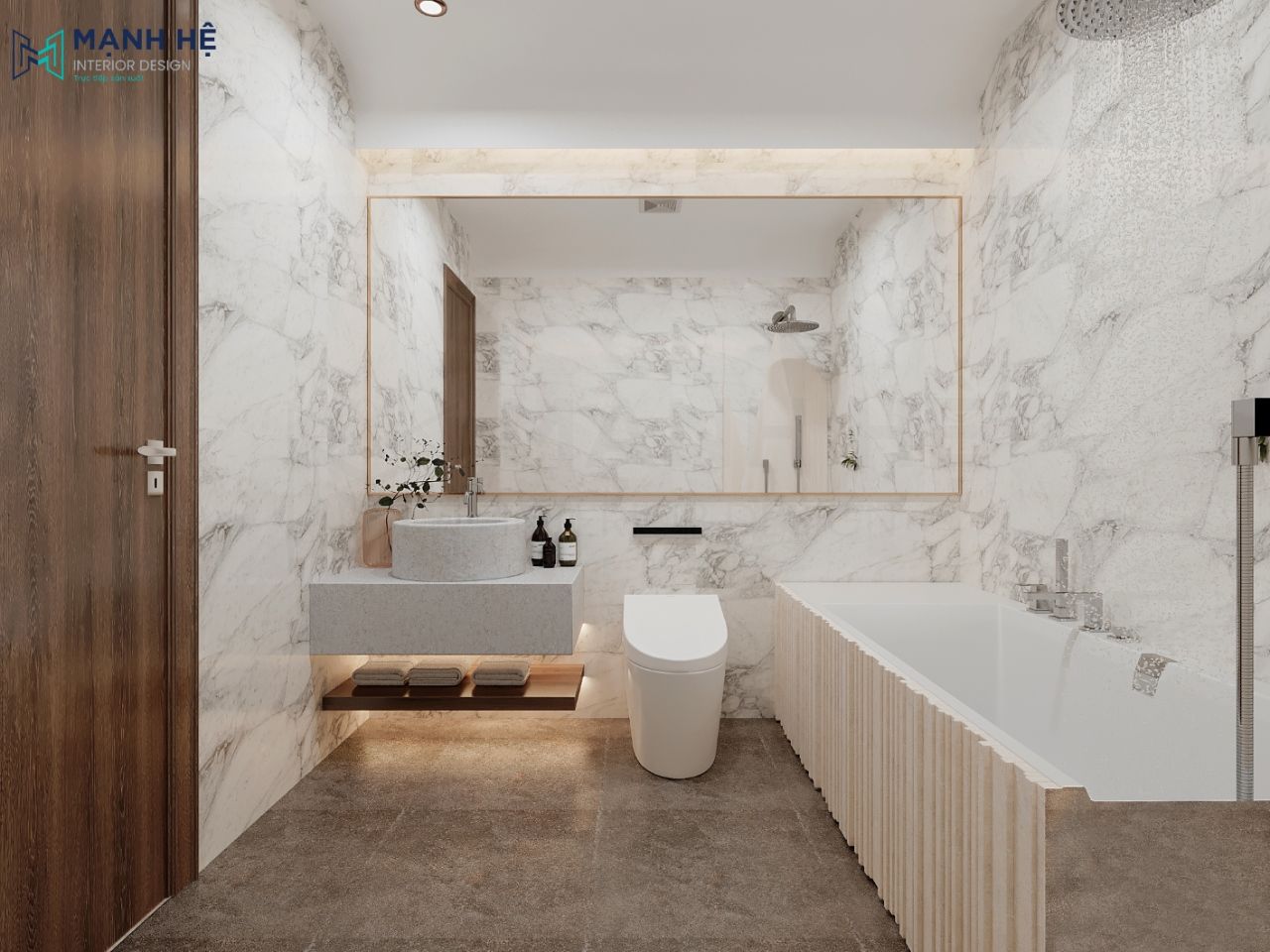 Nhà vệ sinh được ốp gạch toàn bộ với đầy đủ tiện nghi và chiếc gương lớn tạo chiều sâu và tăng sự sang trọng cho căn phòng