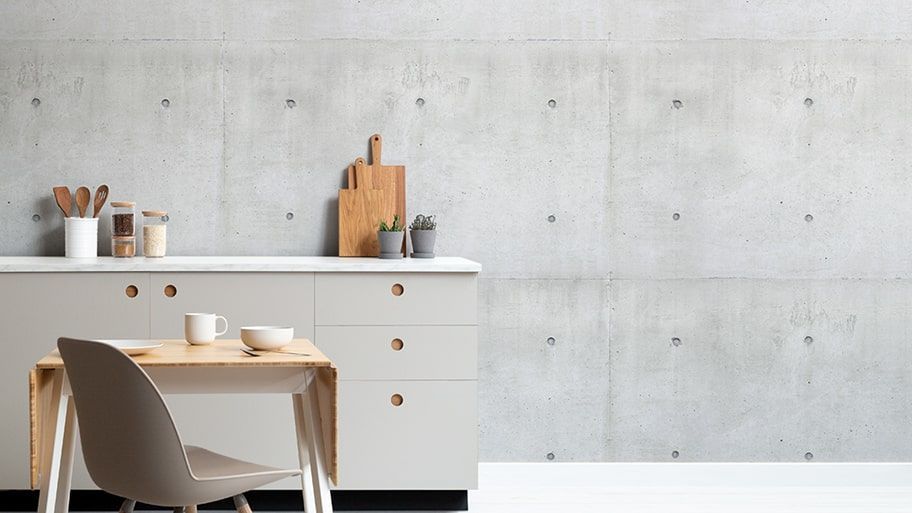 Giấy dán tường hình lỗ nhỏ hài hòa với thiết kế bàn bếp