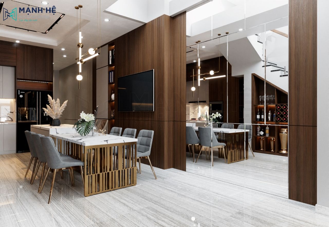 Tường phòng bếp được ốp vách lam gỗ toàn bộ kết hợp với gương tăng chiều sâu cho gian bếp