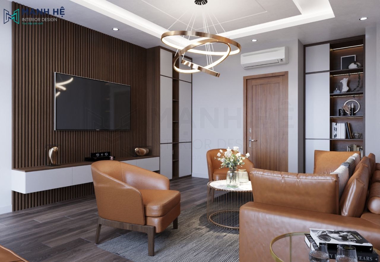 Hệ tủ tivi treo tường và tường tivi được ốp lam gỗ màu nâu đậm tăng sự quyền lực cho tổng thể không gian phòng khách