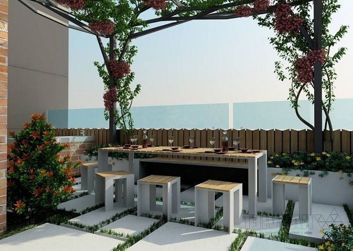 Không gian cực chill với bàn trà bên dưới giàn hoa giấy đang nở rộ