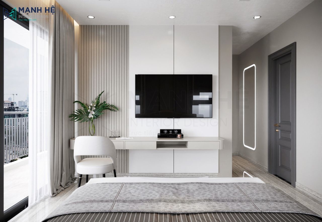 Hệ tủ tivi được thiết kế treo tường tích hợp với góc làm việc đơn giản tiện lợi và tối ưu diện tích cho gian phòng.