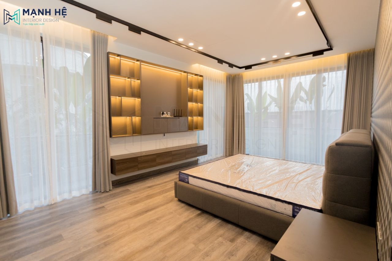 Thi công nội thất phòng ngủ master bằng gỗ công nghiệp tông trầm cho không gian trở nên nhẹ nhàng và tinh tế hơn