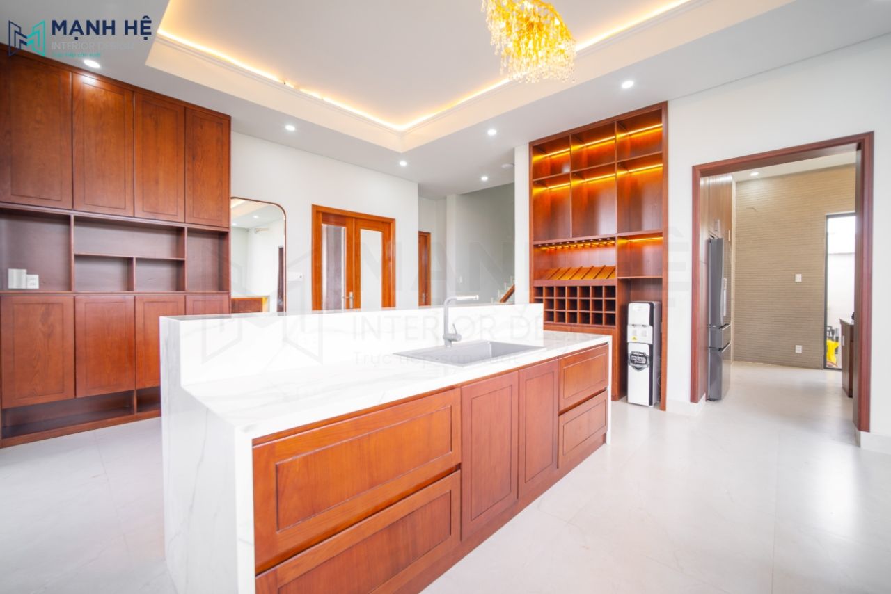Tận dụng bồn rửa làm hệ tủ lưu trữ tiện dụng cho không gian phòng ăn