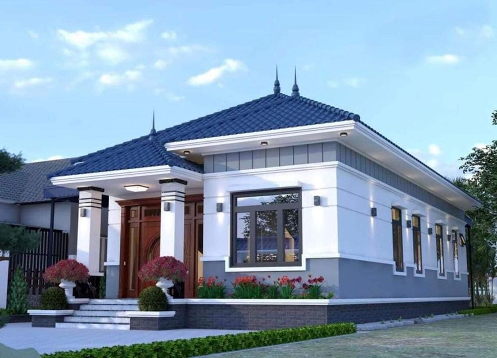 Nhà mái Thái giả biệt thự với ngói màu xanh dương đẹp mắt
