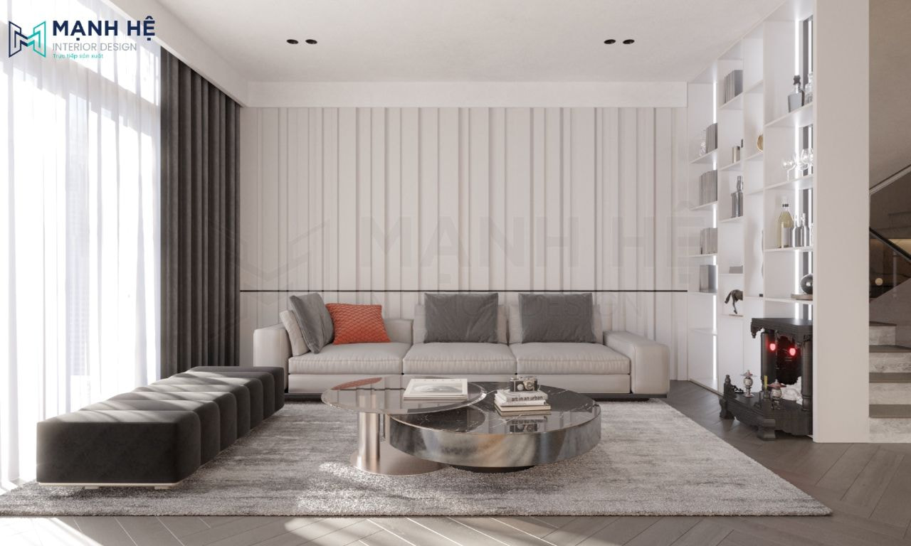Bố trí bộ bàn trà và ghế sofa hình chữ L kết hợp thảm trải sàn tinh tế