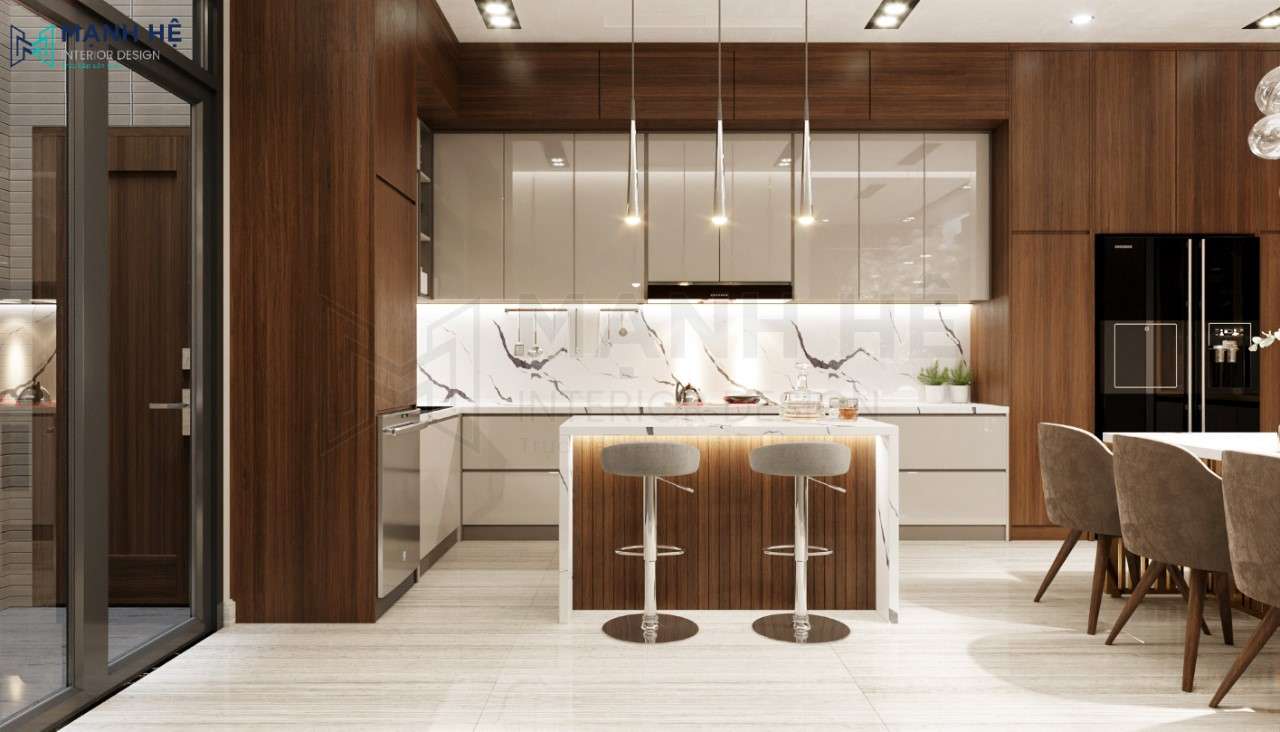 Nhà bếp được thiết kế dạng chữ L có bàn đảo bếp giúp tối ưu được diện tích không gian và phần vách bếp được ốp đá granite tôn lên sự sang trọng cho không gian