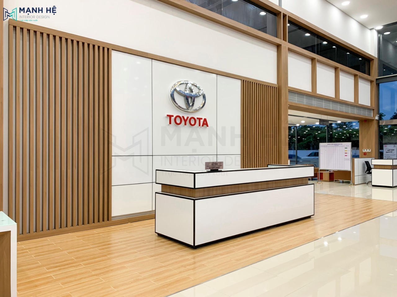 3-thi-cong-quay-le-tan Thi công nội thất văn phòng showroom Toyota Bình Phước