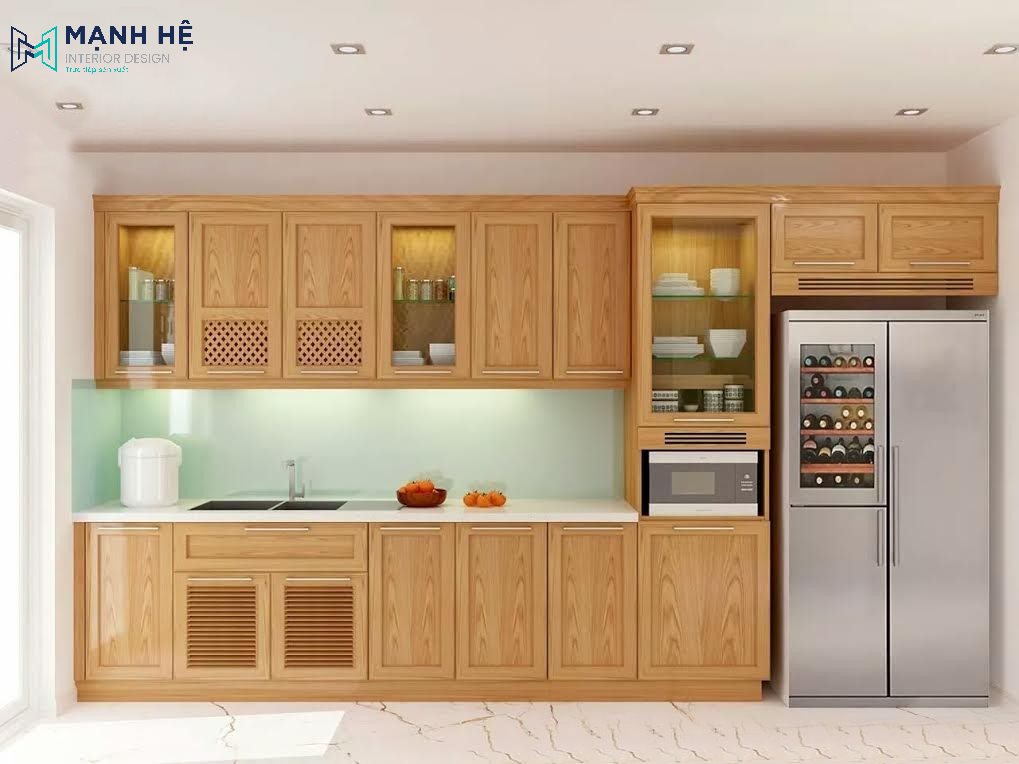Tủ bếp gỗ xoan đào gam màu vàng sáng kết hợp cùng màu xanh ngọc nhẹ nhàng tinh tế 