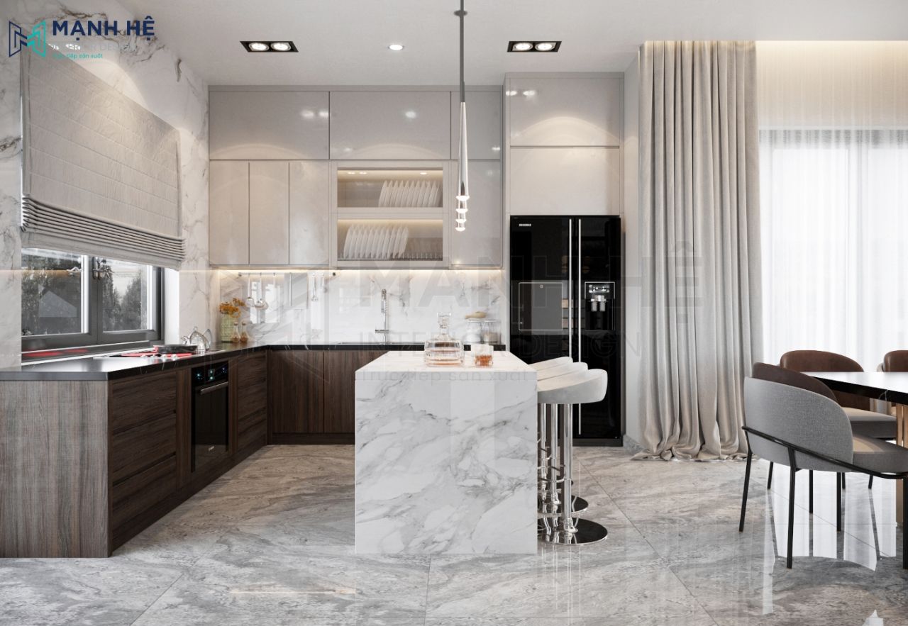 Tủ bếp và bàn ăn ngăn cách nhau bởi chiếc bàn đảo bếp kết hợp quầy bar