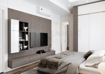 Giường ngủ và kệ tivi được sử dụng chung vật liệu và màu sắc tạo cảm giác đồng điệu