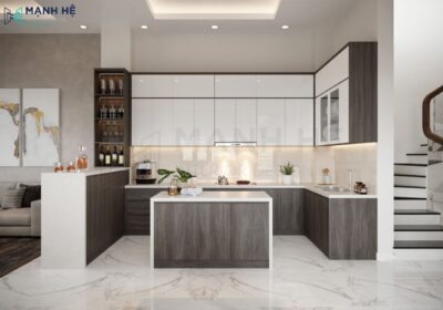 Hệ tủ bếp được thiết kế dạng chữ U kết hợp phủ Acrylic sáng bóng tạo điểm nhấn sang trọng