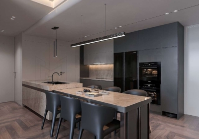 Thiết kế bàn đảo bếp tích hợp bồn rửa nối liền với bộ bàn ăn giúp khu vực nấu nướng rộng rãi, thông thoáng hơn.