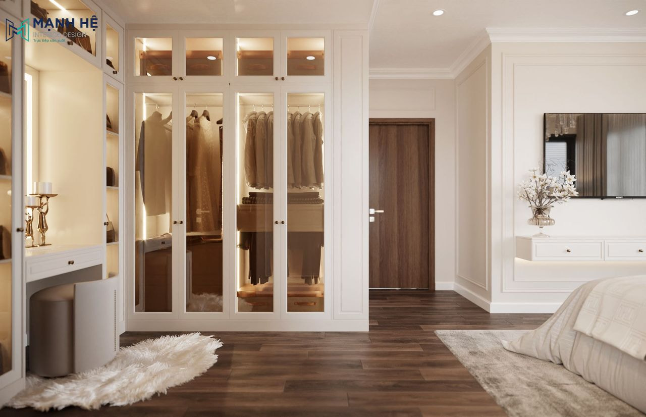 Thiết kế khu vực thay đồ với hệ tủ quần áo cánh kính tích hợp bàn trang điểm