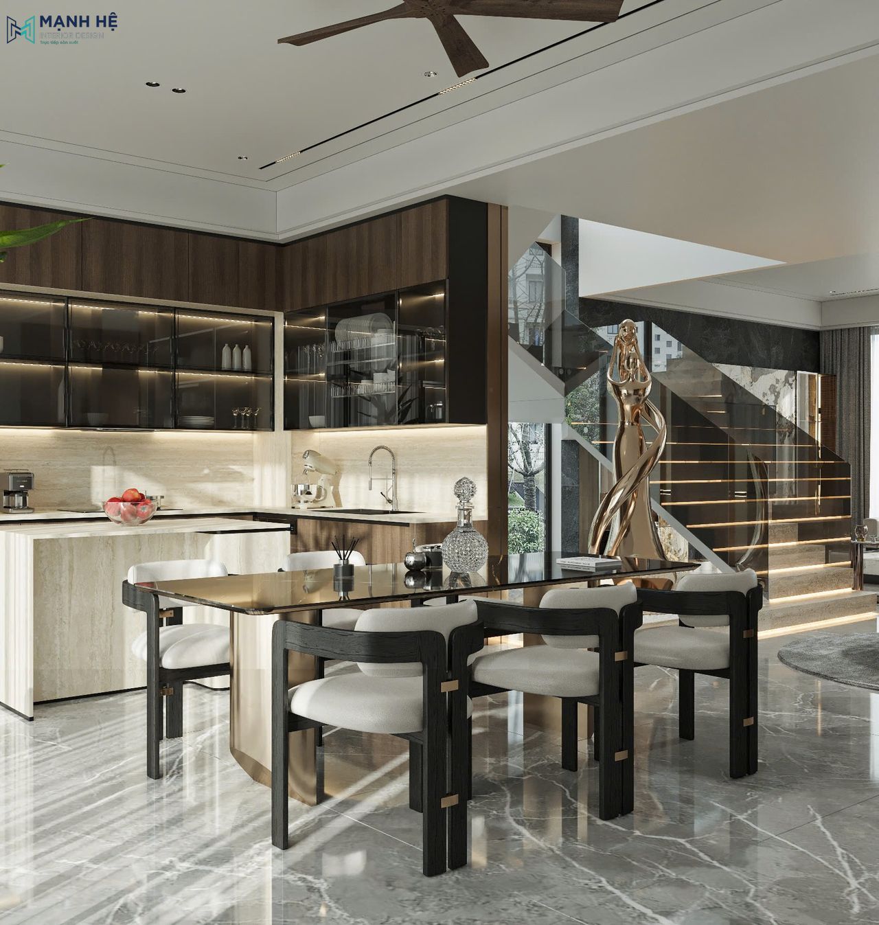 Hệ tủ bếp chữ L trong villa hiện đại sử dụng hai tông màu nâu phối hợp, kết hợp mặt đá sáng và đảo bếp nhỏ gọn, tạo điểm nhấn thẩm mỹ và chiều sâu cho gian bếp