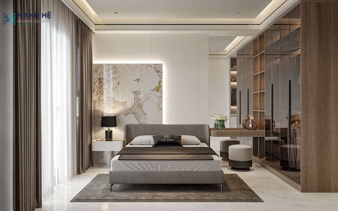Phòng ngủ matser với giường bọc nệm xám kết hợp vách đầu giường được ốp đá kết hợp đèn hắt