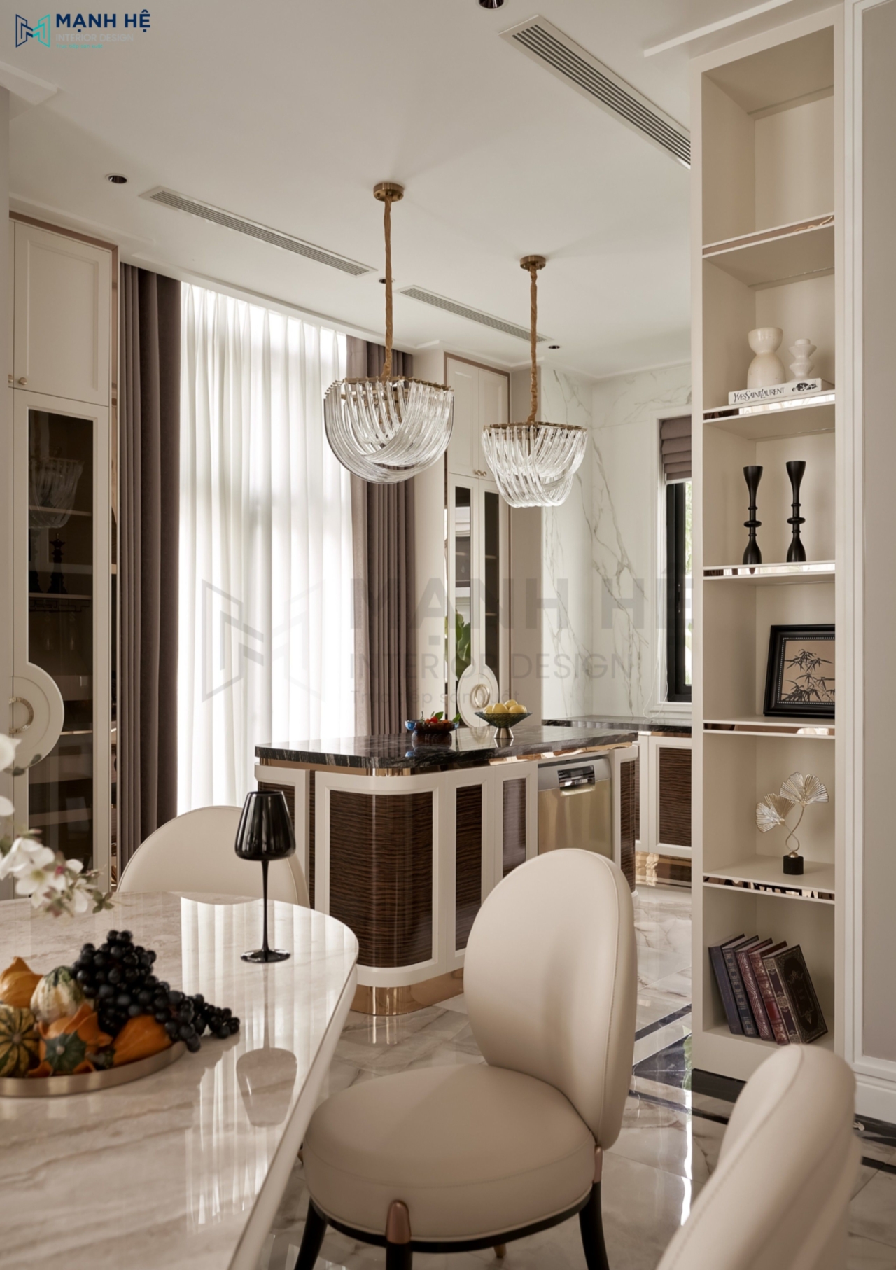 Hệ đèn thả trần pha lê nghệ thuật kết hợp cùng kệ trang trí mở tạo điểm nhấn tinh tế, sang trọng cho không gian.
